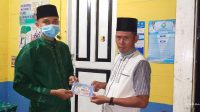 Cegah Penyebaran Corona, Pemdus Rantau Pandan Bagikan 4000 Masker