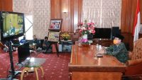 Gubernur Jambi Menerima Laporan Kepala Daerah melalui Teleconference