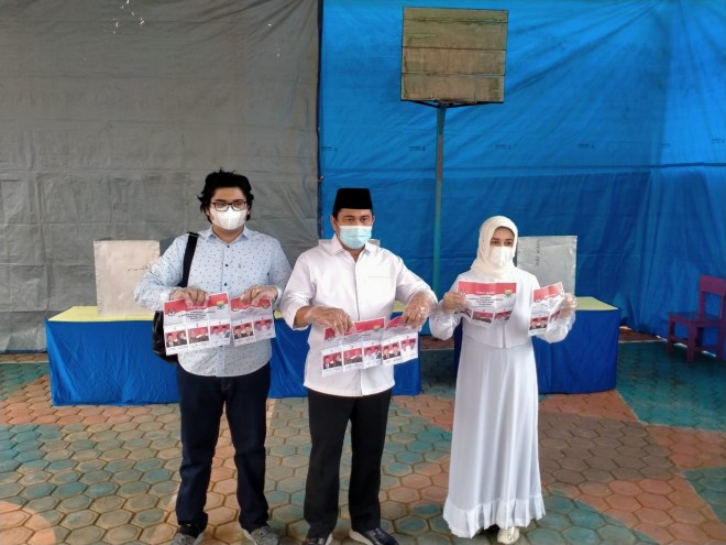 Bupati Bungo Mashuri Bersama Istri Nyoblos di TPS 05 Kelurahan Bungo Timur