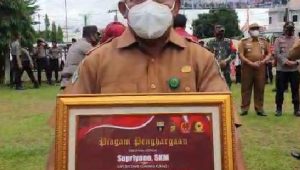 foto kepala puskesmas kuamang kuning