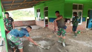 foto personil satgas tmmd112 cor lantai masjid