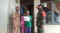 kodim0416-tmmd Babinsa Koramil 06/Muara Bungo Door to door Kawal Penyaluran BLT Dana Desa