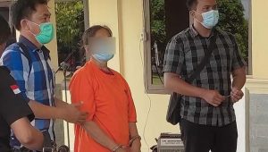 foto pelaku baju orange