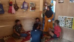 foto satgas tmmd112 bersama warga 1