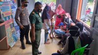 Danramil 416-05/Muara Tebo Bersama Kapolsek Tebo Tengah Turun Langsung Pantau Penyaluran Bantuan Pangan Non Tunai Tahap 1