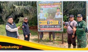 Cegah Pencurian Sawit, Bhabinkamtibmas Polsek Bathin II Pelayang Gencar Pasang Spanduk Himbauan Kamtibmas